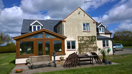 A few years later with new roof and dormers