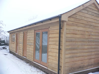 Timber garden studio oak cladding